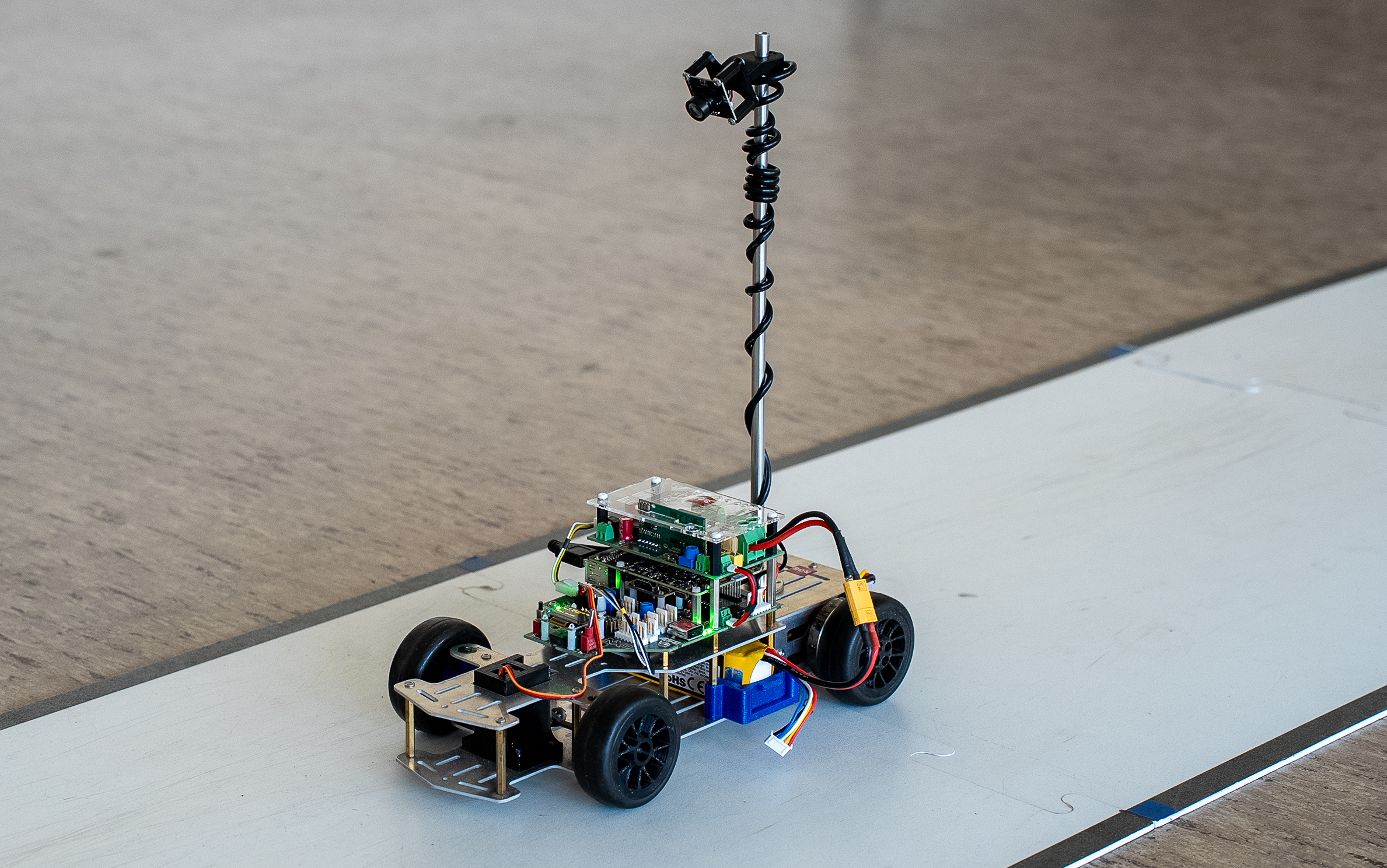 A picture of the ASE Rover placed on the track